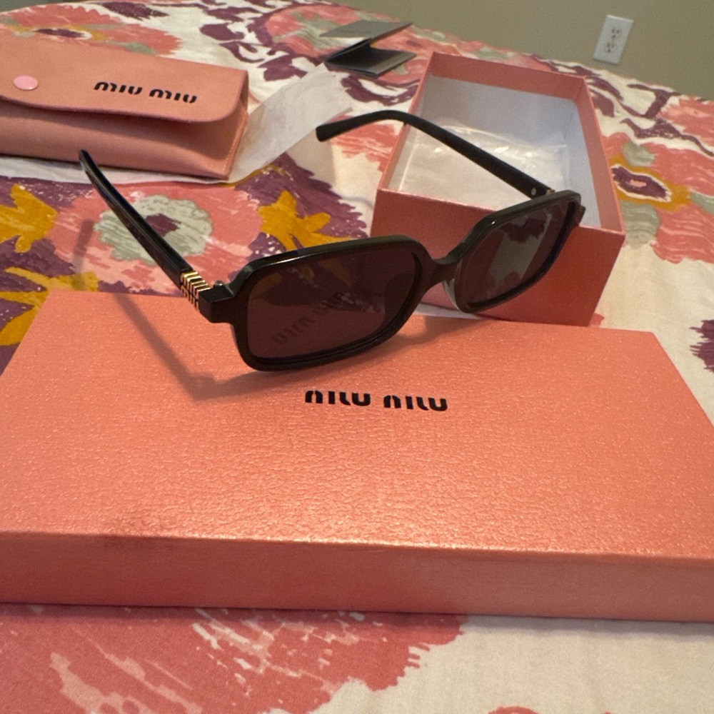 Miu Miu Black Sunglasses with Dark Lenses